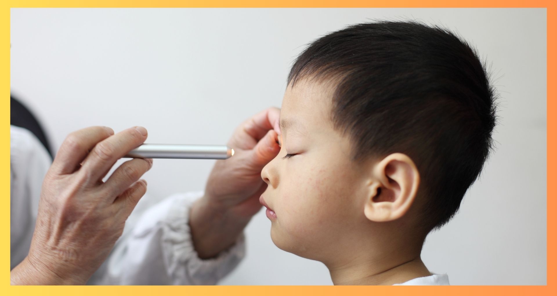 Young boy having a routine eye exam